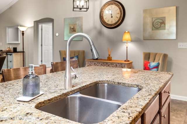 338 Deerfield Glen Dr, Saint Augustine, FL 32086 - kitchen featuring light stone countertops and tile patterned floors