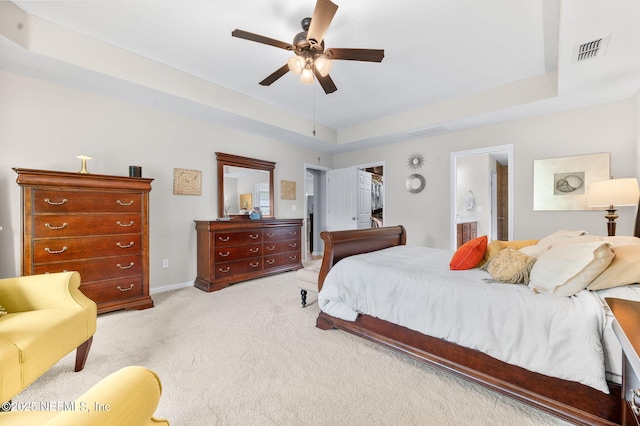 338 Deerfield Glen Dr, Saint Augustine, FL 32086 - bedroom featuring light carpet, ensuite bathroom, a closet, a ceiling fan, and a walk in closet