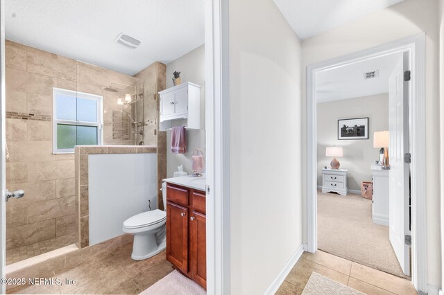 338 Deerfield Glen Dr, Saint Augustine, FL 32086 - full bathroom featuring a walk in shower, tile patterned flooring, and vanity