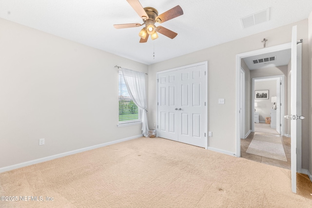 338 Deerfield Glen Dr, Saint Augustine, FL 32086 - unfurnished bedroom featuring carpet floors, a closet, and a ceiling fan
