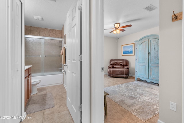 338 Deerfield Glen Dr, Saint Augustine, FL 32086 - bathroom with a ceiling fan, tile patterned flooring, vanity, and shower / bath combination with glass door
