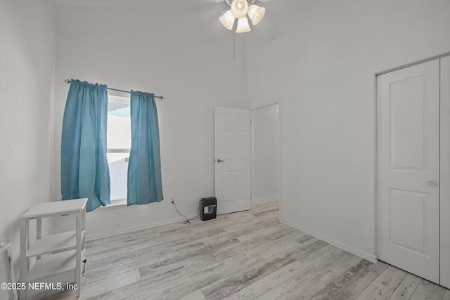 1206 Mayport Landing Cir, Jacksonville, FL 32233 - unfurnished room with a ceiling fan, wood finished floors, and a towering ceiling