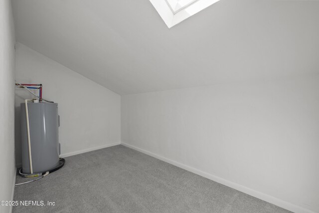 1206 Mayport Landing Cir, Jacksonville, FL 32233 - bonus room with water heater, lofted ceiling, carpet, and a skylight