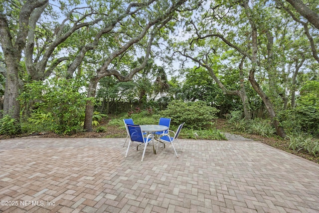 521 Birch Ct, Neptune Beach, FL 32266 - view of patio / terrace featuring outdoor dining space