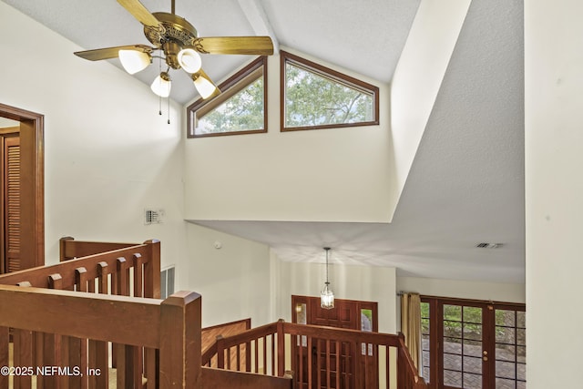 521 Birch Ct, Neptune Beach, FL 32266 - stairs with a ceiling fan, high vaulted ceiling, and plenty of natural light