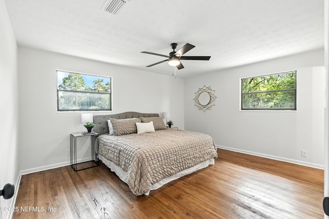 1900 Dalamon St, Jacksonville, FL 32211 - bedroom featuring wood finished floors and a ceiling fan