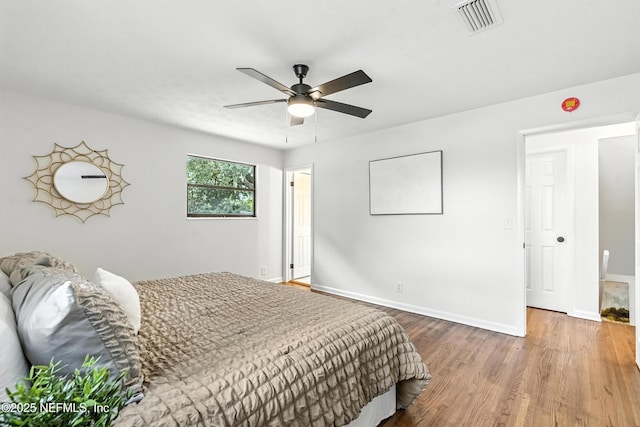 1900 Dalamon St, Jacksonville, FL 32211 - bedroom featuring wood finished floors and ceiling fan