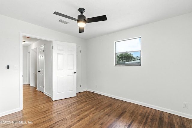 1900 Dalamon St, Jacksonville, FL 32211 - unfurnished bedroom with wood finished floors and ceiling fan