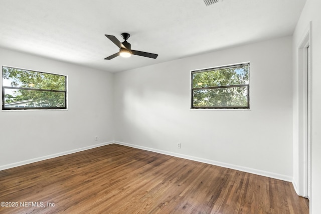 1900 Dalamon St, Jacksonville, FL 32211 - spare room with plenty of natural light, wood finished floors, and ceiling fan