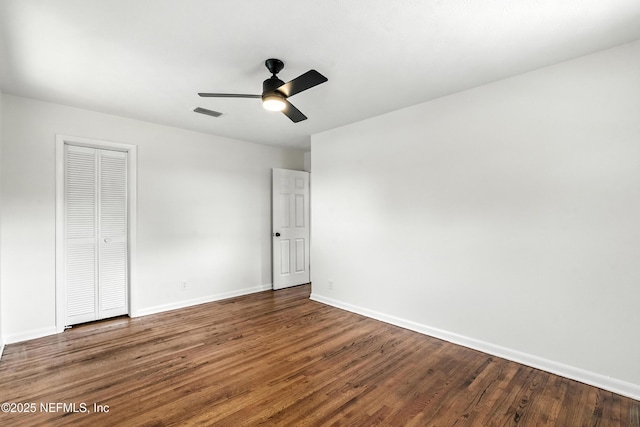 1900 Dalamon St, Jacksonville, FL 32211 - unfurnished bedroom with wood finished floors, a closet, and ceiling fan