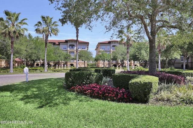 4300 S Beach Pkwy Unit 3206, Jacksonville Beach, FL 32250 - view of property's community featuring a yard