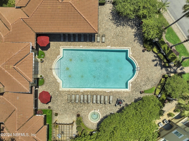 4300 S Beach Pkwy Unit 3206, Jacksonville Beach, FL 32250 - aerial view of property and surrounding area featuring a pool