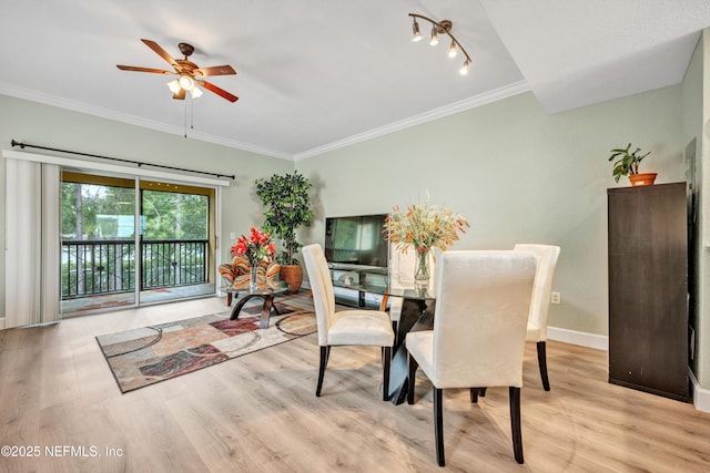9745 Touchton Rd Unit 121, Jacksonville, FL 32246 - dining area with light wood-type flooring, crown molding, and ceiling fan