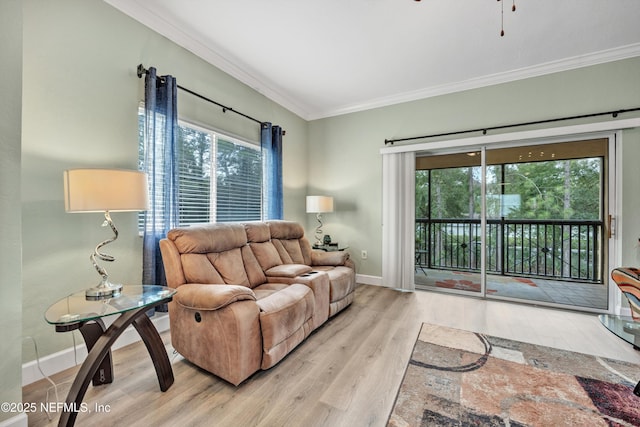 9745 Touchton Rd Unit 121, Jacksonville, FL 32246 - living area with ornamental molding, wood finished floors, and a ceiling fan
