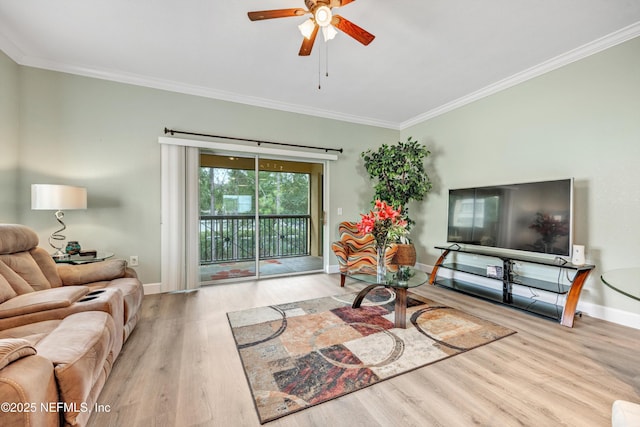 9745 Touchton Rd Unit 121, Jacksonville, FL 32246 - living area featuring crown molding, a ceiling fan, and wood finished floors