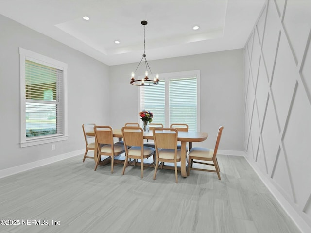 32 Awlleaf Ct, Saint Augustine, FL 32095 - dining space with a tray ceiling, healthy amount of natural light, a chandelier, and recessed lighting