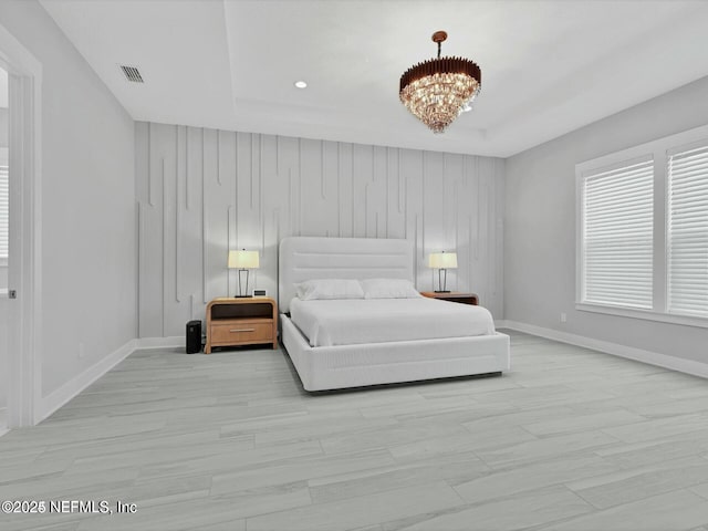32 Awlleaf Ct, Saint Augustine, FL 32095 - bedroom with a chandelier, a tray ceiling, and recessed lighting