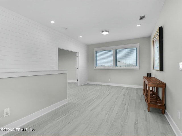 32 Awlleaf Ct, Saint Augustine, FL 32095 - empty room with light wood-style flooring and recessed lighting