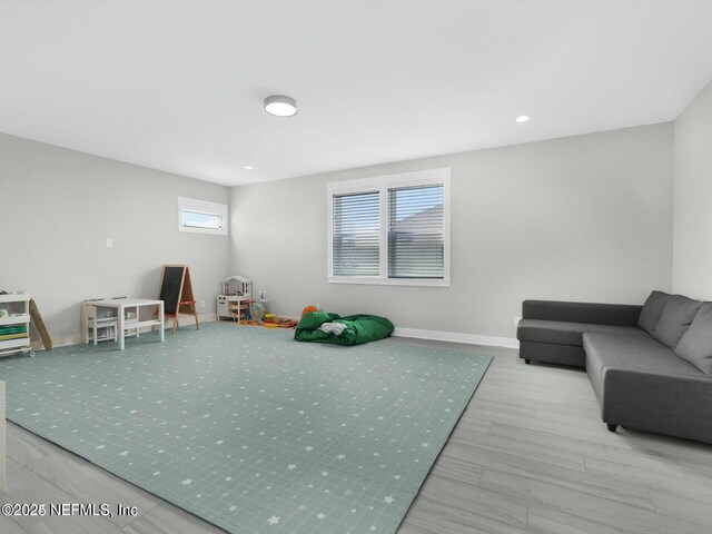 32 Awlleaf Ct, Saint Augustine, FL 32095 - rec room featuring healthy amount of natural light and wood finished floors