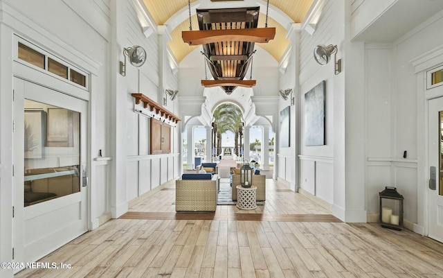 32 Awlleaf Ct, Saint Augustine, FL 32095 - entrance foyer with a decorative wall, wood finished floors, and high vaulted ceiling
