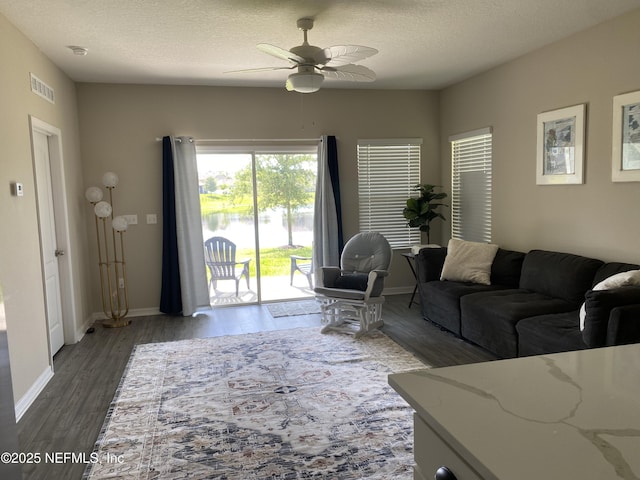 66 Tree Frog Way, Saint Augustine, FL 32095 - living area featuring ceiling fan, wood finished floors, and a textured ceiling