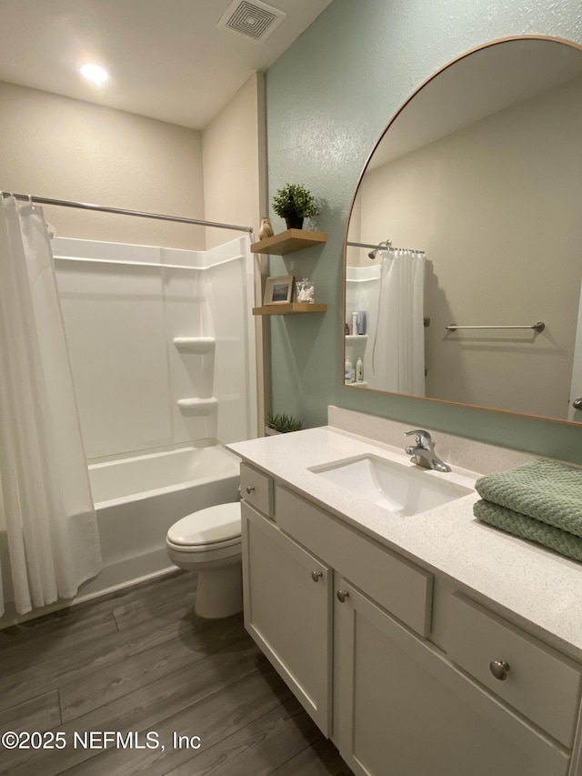 66 Tree Frog Way, Saint Augustine, FL 32095 - bathroom featuring vanity, shower / bath combination with curtain, and wood finished floors