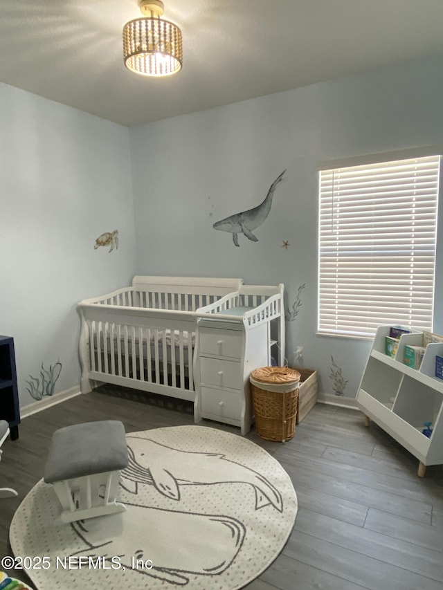 66 Tree Frog Way, Saint Augustine, FL 32095 - bedroom with wood finished floors and a nursery area