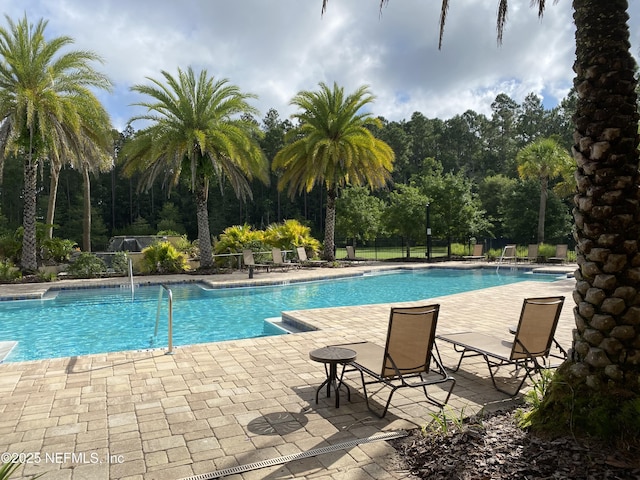 66 Tree Frog Way, Saint Augustine, FL 32095 - community pool featuring a patio