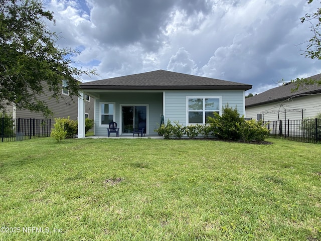 66 Tree Frog Way, Saint Augustine, FL 32095 - back of house featuring a patio area and roof with shingles