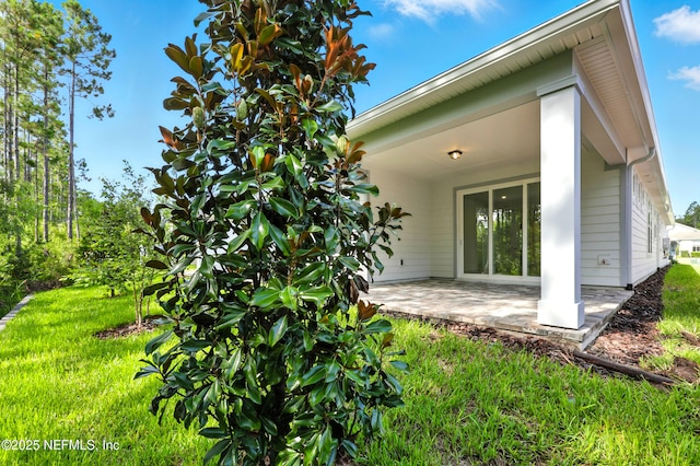 81 Glenhurst Ave, Ponte Vedra, FL 32081 - rear view of house with a patio area and a yard