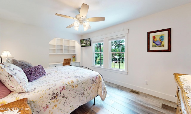 3793 Forest Dr, Middleburg, FL 32068 - bedroom featuring wood finished floors and ceiling fan