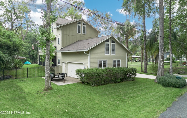 3793 Forest Dr, Middleburg, FL 32068 - view of side of home featuring concrete driveway, an attached garage, and roof with shingles