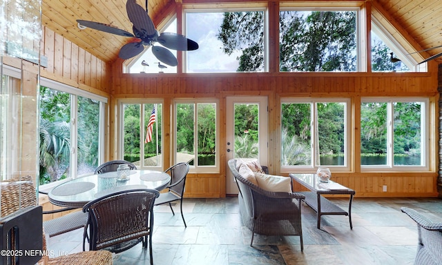 3793 Forest Dr, Middleburg, FL 32068 - sunroom featuring stone tile flooring, wooden walls, high vaulted ceiling, and wood ceiling