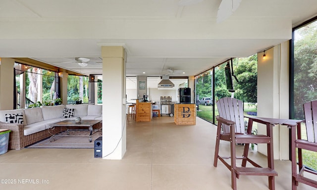 3793 Forest Dr, Middleburg, FL 32068 - view of patio with a ceiling fan, an outdoor living space, and an outdoor kitchen