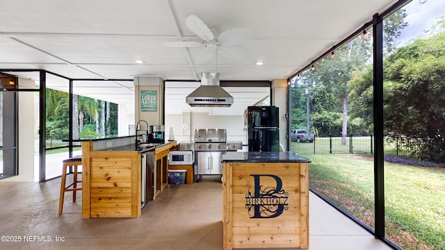 3793 Forest Dr, Middleburg, FL 32068 - sunroom featuring plenty of natural light, ceiling fan, and area for grilling