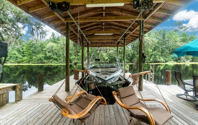 3793 Forest Dr, Middleburg, FL 32068 - dock featuring a water view, boat lift, and view of wooded area