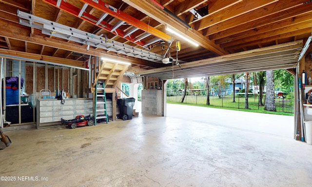 3793 Forest Dr, Middleburg, FL 32068 - garage featuring a garage door opener