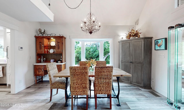 3793 Forest Dr, Middleburg, FL 32068 - dining space featuring a chandelier and light wood-style flooring
