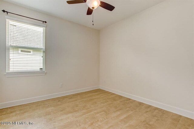 85212 Champlain Dr, Fernandina Beach, FL 32034 - spare room with a ceiling fan and light wood-style flooring