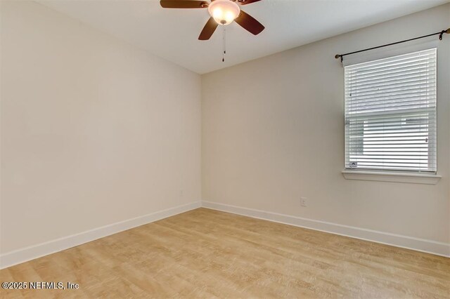 85212 Champlain Dr, Fernandina Beach, FL 32034 - spare room with light wood-style flooring and a ceiling fan