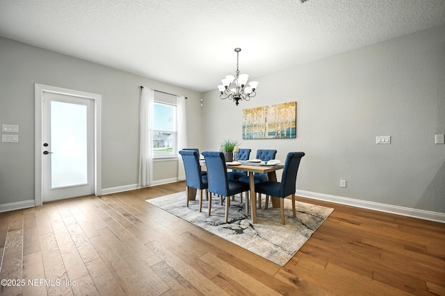24 Tradesman Ln, Saint Johns, FL 32259 - dining space featuring hardwood / wood-style flooring and a chandelier