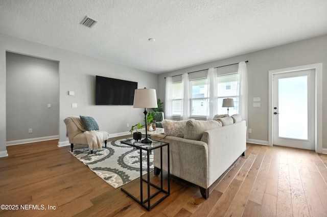 24 Tradesman Ln, Saint Johns, FL 32259 - living room featuring hardwood / wood-style floors and a textured ceiling