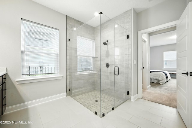 24 Tradesman Ln, Saint Johns, FL 32259 - full bath featuring ensuite bath, a stall shower, vanity, and tile patterned floors