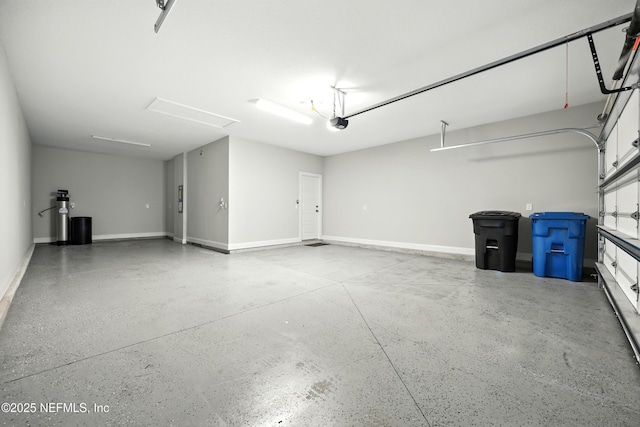 24 Tradesman Ln, Saint Johns, FL 32259 - garage with a garage door opener and baseboards