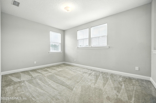 24 Tradesman Ln, Saint Johns, FL 32259 - spare room with carpet flooring and a textured ceiling