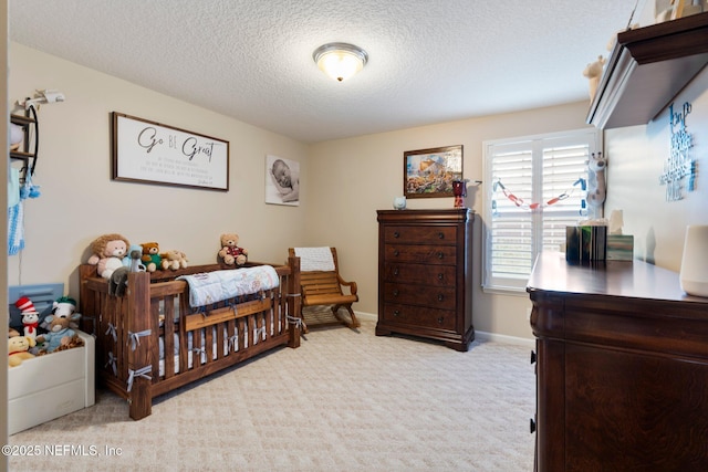 2025 Castle Point Ct, Fleming Island, FL 32003 - bedroom featuring carpet flooring, a textured ceiling, and a nursery area