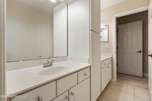 2025 Castle Point Ct, Fleming Island, FL 32003 - bathroom with vanity and tile patterned floors