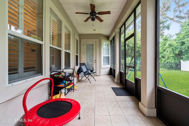 2025 Castle Point Ct, Fleming Island, FL 32003 - sunroom / solarium featuring a ceiling fan and plenty of natural light