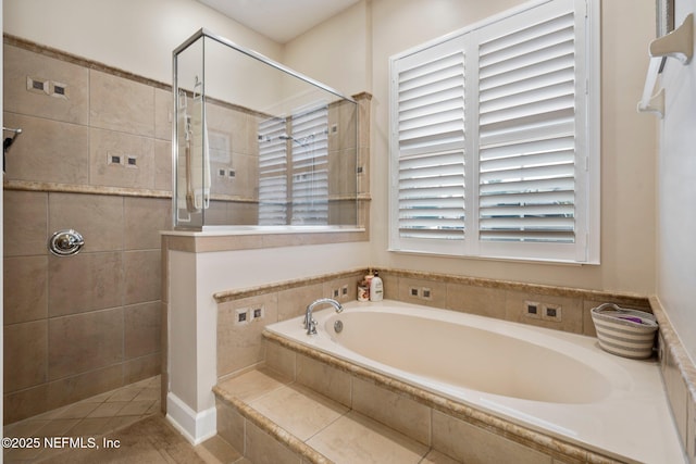 2025 Castle Point Ct, Fleming Island, FL 32003 - full bathroom featuring a garden tub, tiled shower, and tile patterned flooring
