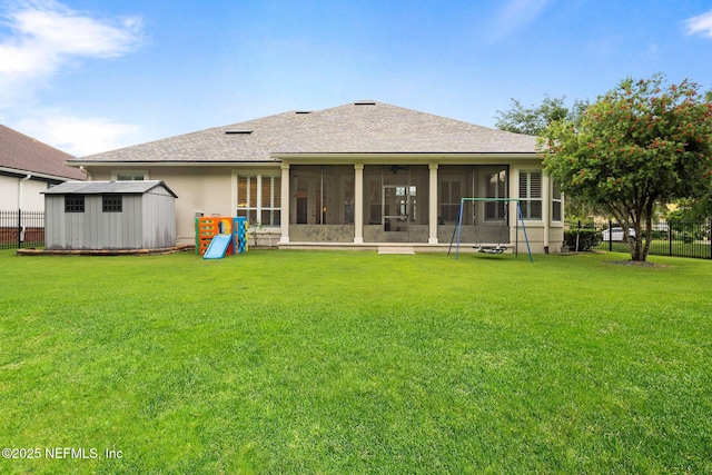 2025 Castle Point Ct, Fleming Island, FL 32003 - rear view of house featuring a sunroom, a storage shed, roof with shingles, a fenced backyard, and a ceiling fan